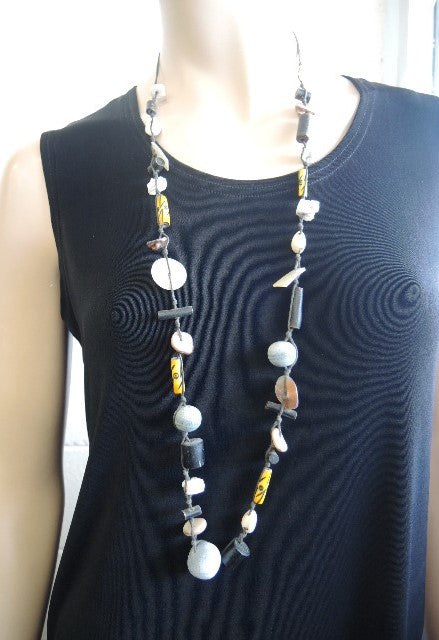 Shell and bead long length necklace.